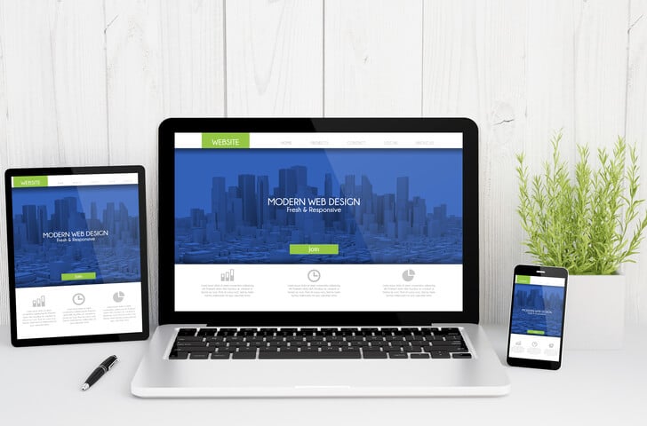 modern responsive web design on computer by REM Web Solutions