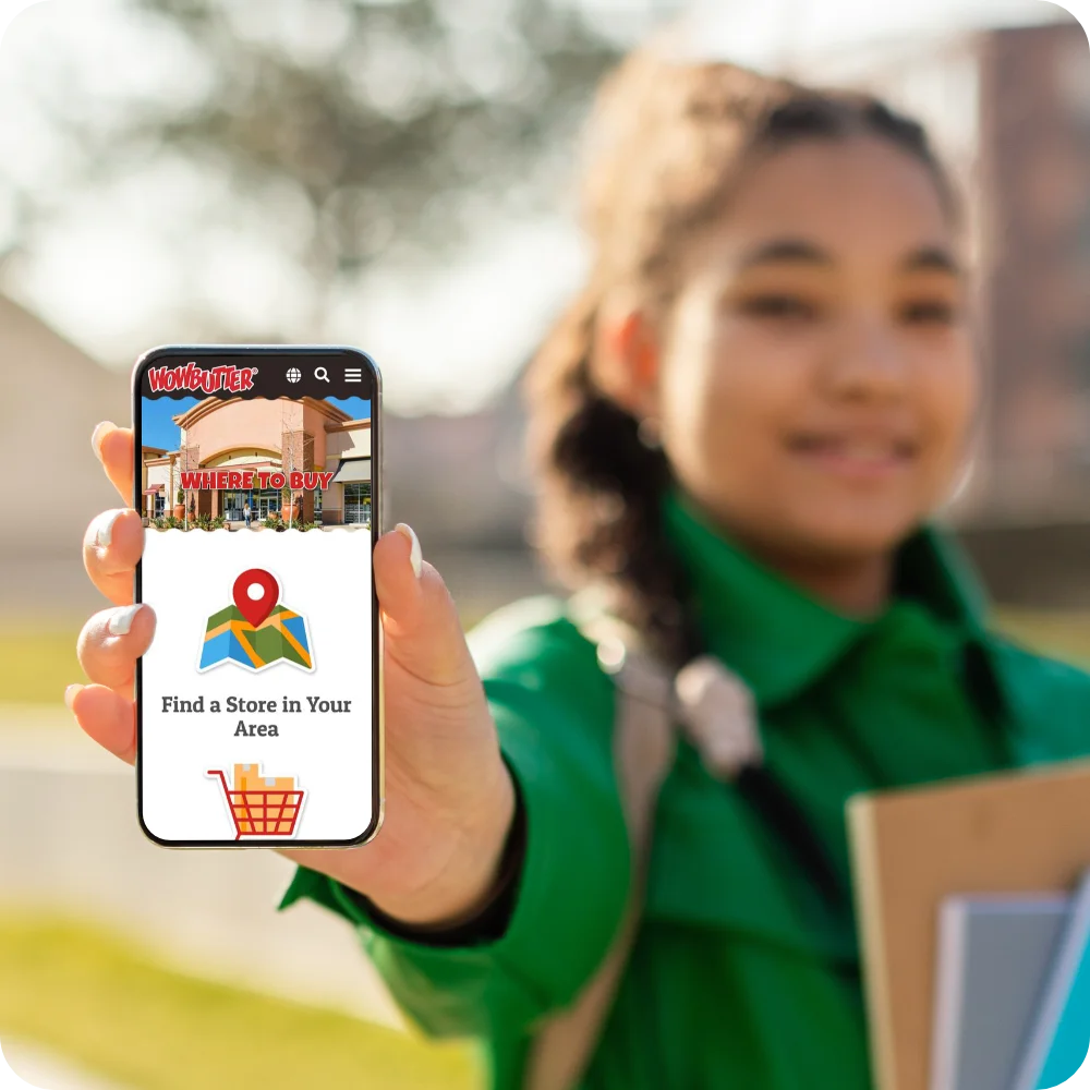 Student showing WOWBUTTER on phone