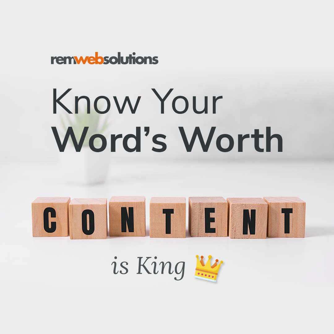 Block letters on a table that say content is king