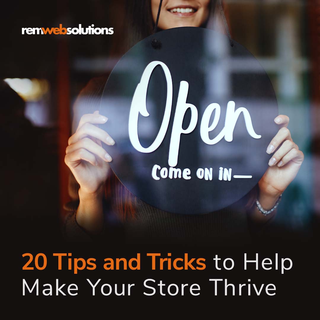 Woman holding a store's Open sign