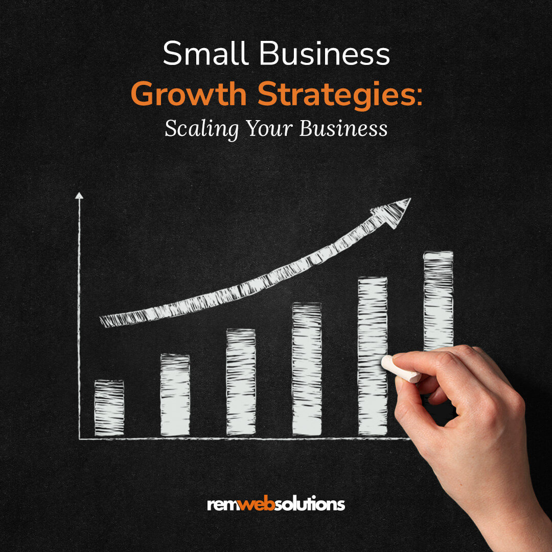 Hand drawing an upwards trend on graph on a chalk board. 