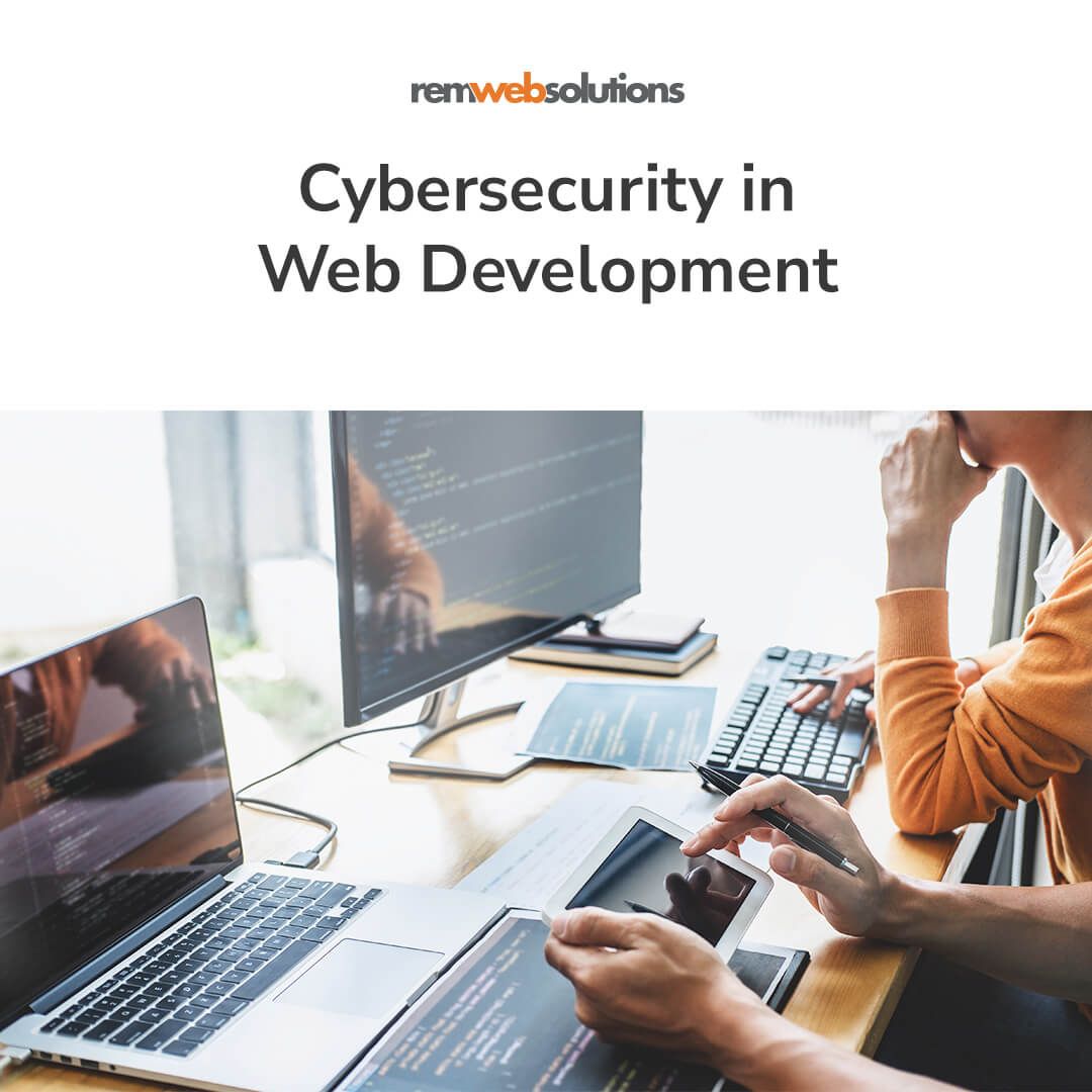 Web developers on tablet and desktop computers. "Cybersecurity in Web Development" REM Web Solutions