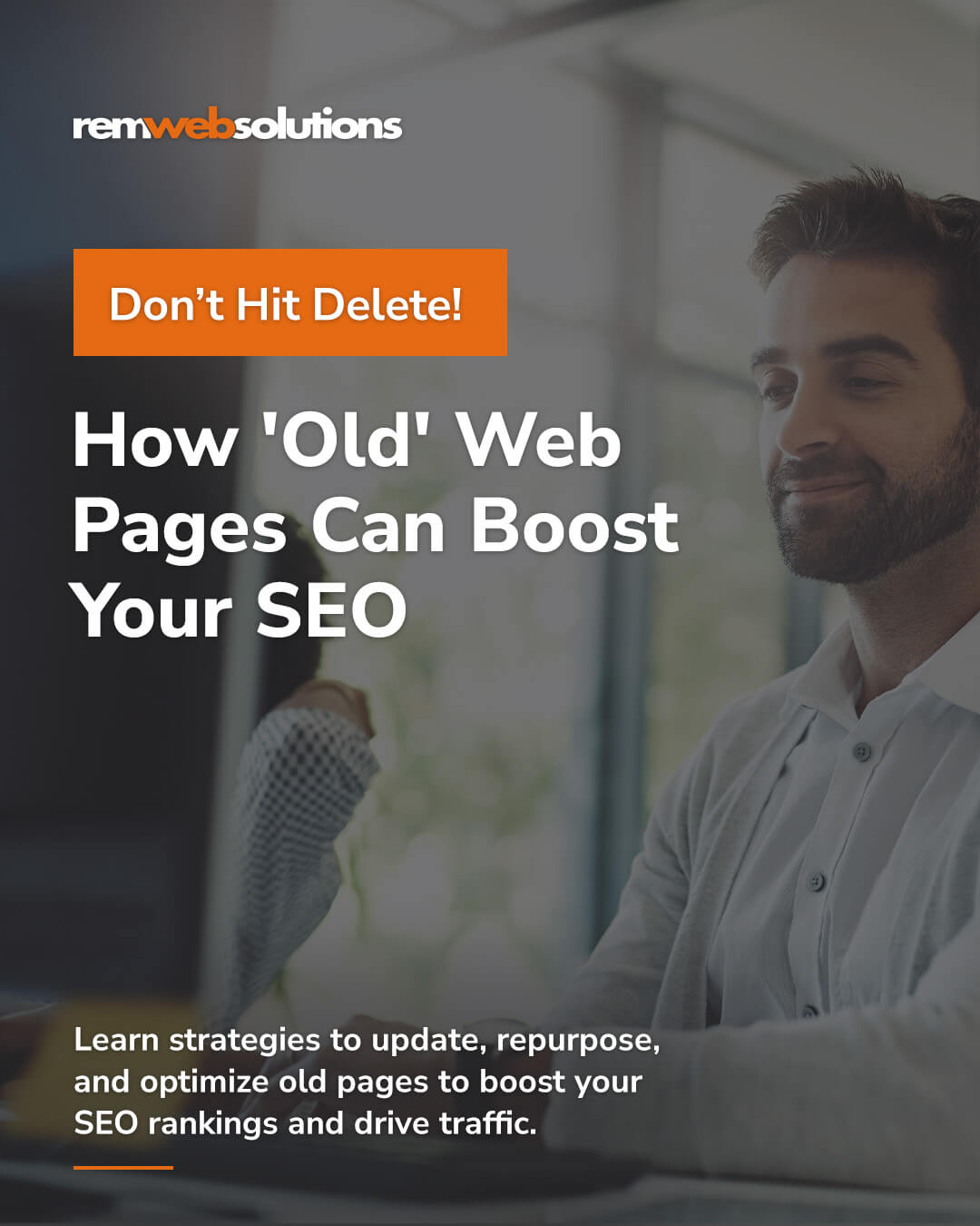 Man in office setting on desktop computer 