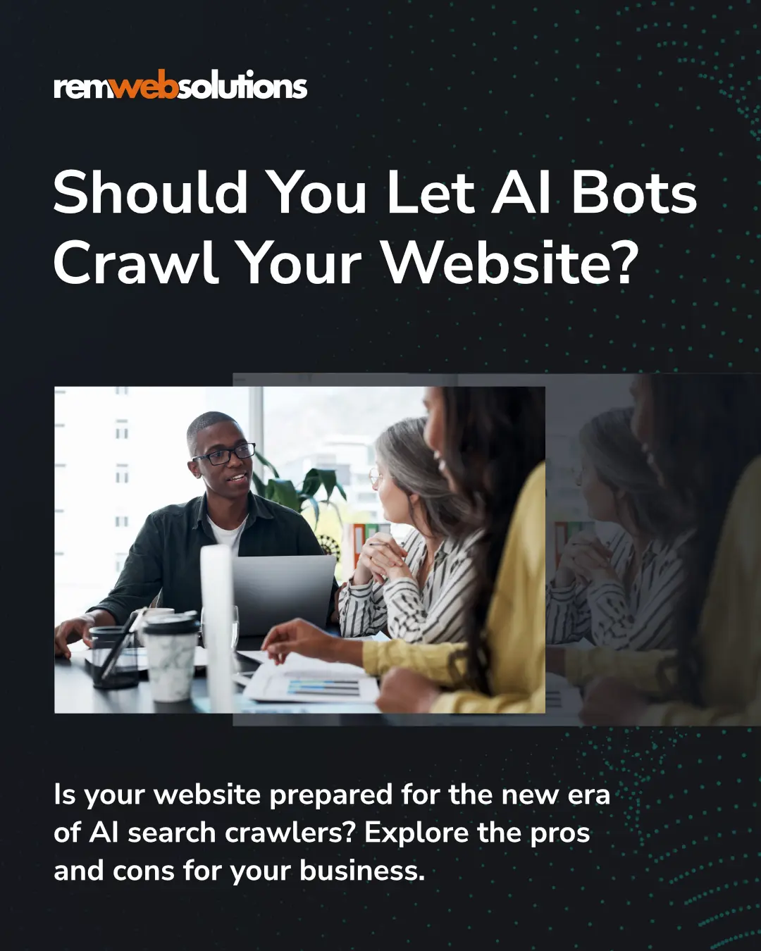 Group of colleagues having a discussion in a modern office, with one person speaking while using a laptop during a meeting.