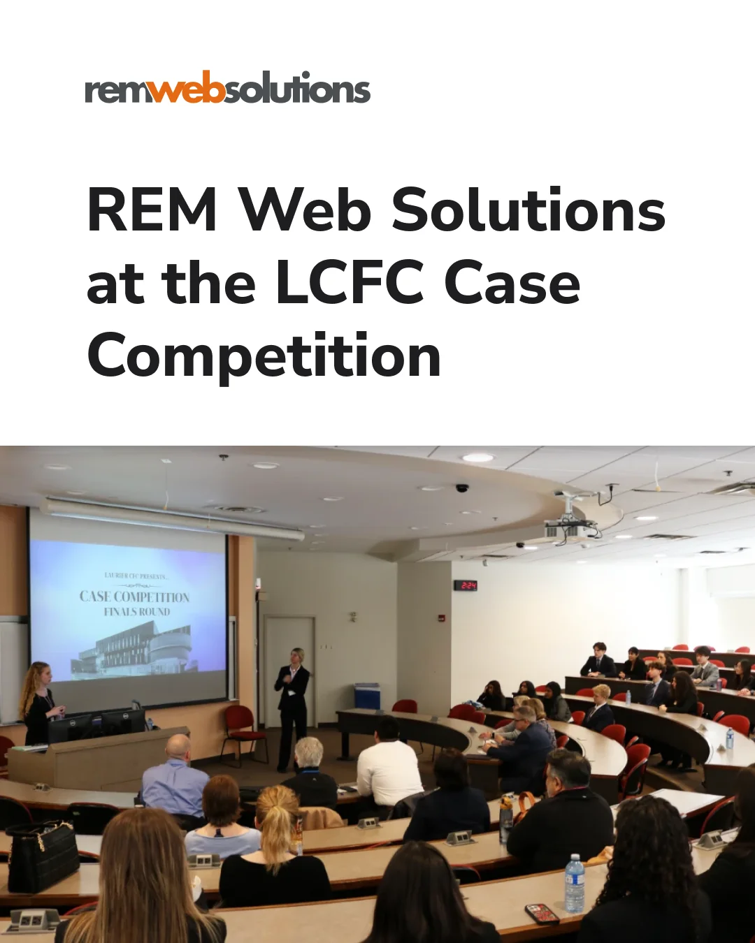 Students in LCFC case competition presenting in auditorium